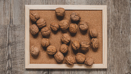 walnuts on a cork tray