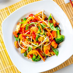 sweet and sour chicken with rice and vegetables