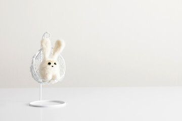Easter bunny on white background. Minimum Easter holiday concept. copy space, close-up