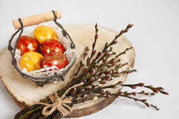 easter eggs in a basket on a wooden stand