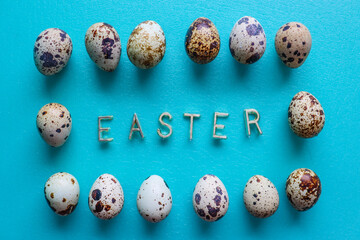 Happy Easter greeting card. A frame with small spotty eggs with the golden letters saying 