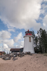 lighthouse on the sandy shore