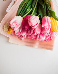 Pink fresh tulips flowers on white background