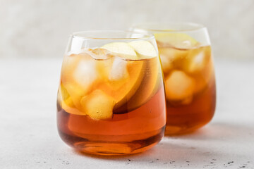 Apple iced tea in glasses. Space ofr text.