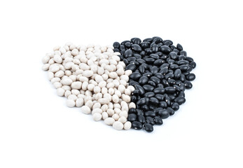 white beans and black beans on white background.