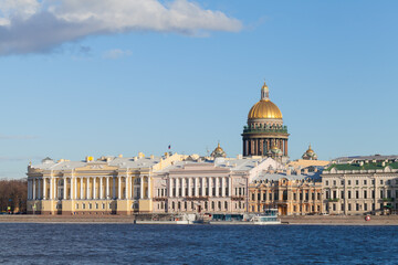 Fototapeta na wymiar Neva river coast with Isaakievsky Cathedral