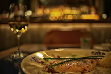 evening in a restaurant, blurred abstract background, bokeh, alcohol concept, wine glasses in a bar