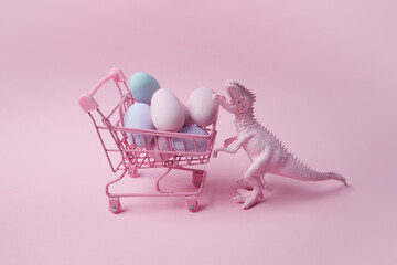 T rex dinosaur with shopping cart and eggs on pink background. Easter mega sale concept.