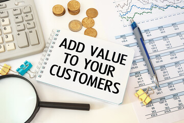 Business concept - notebook writing Add value to your customers
