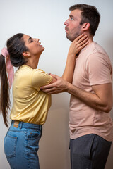 Woman beating up his husband illustrating domestic violence. Violence in a relationship.