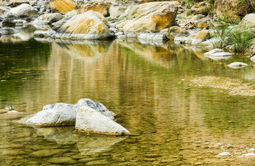 The stones under the pond, close-up as a background.