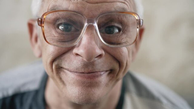 Aged man making funny face