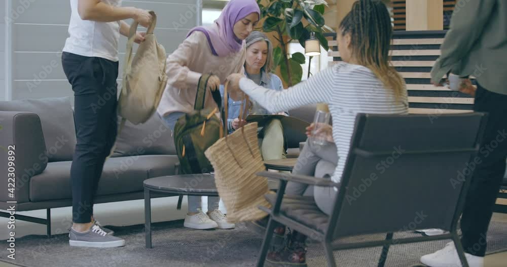 Wall mural Diverse businesspeople meeting in 
an office lounge