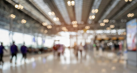 Blurred background of airline check-in counter in departure hall of the airport, travel concept