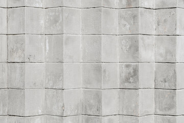 Grey or white concrete brick background, cubes embedded