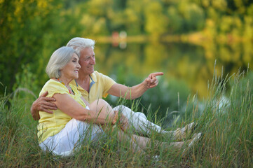 portrait of beautiful happy senior couple  in the park