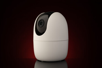 Portable security camera against dark background in red light