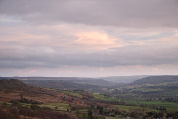 Evening light over the Derwent Valley from Curbar Edge, Peak District, UK