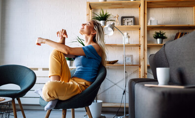 Portrait of relaxing young beautiful woman at home