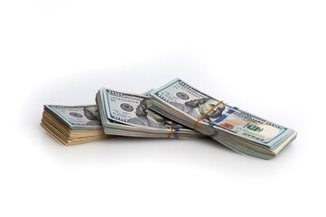 Bundles of packaged dollars on a white background.