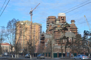 A building and a church are under construction
