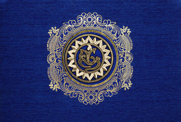 lord Vinayaka emblem with gold color and blue texture backdrop