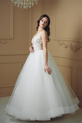 Fototapeta premium Beautiful sensual bride in light interior