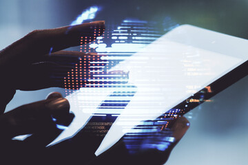 Double exposure of abstract programming language hologram with world map and finger clicks on a...