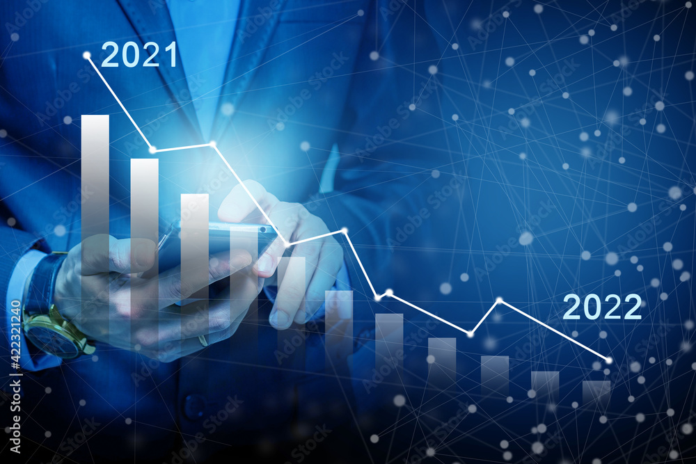 Aufkleber businessman's hand holds a stock graph display in a visual screen. it shows signs of falling stocks 