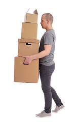 side view of man holding heap of boxes in hands isolated on white background.