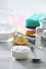 Baking soda on white marble table. Eco friendly detergent