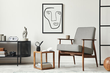 Stylish scandinavian composition of living room with design armchair, black mock up poster frame,...
