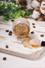 Natural body coffee scrub on marble background