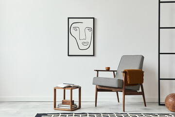 Minimalist composition of living room with design armchair, wooden stool, decoration,  black mock...