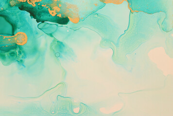 art photography of abstract fluid art painting with alcohol ink, blue and gold colors