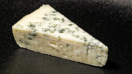 A piece of blue mold cheese