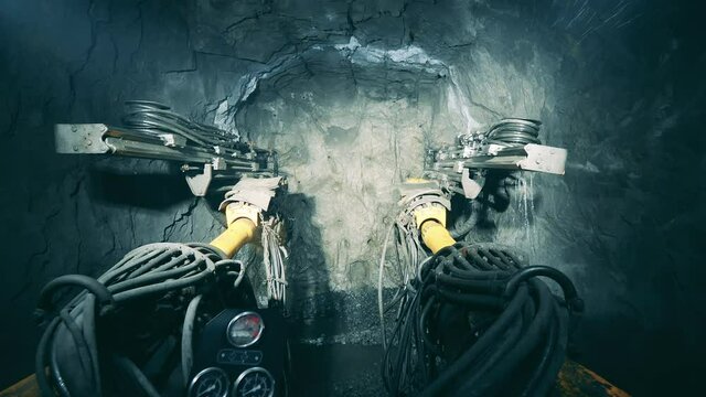 Underground mine with system of pipelines. Underground development, underground extraction, underground mining operations.