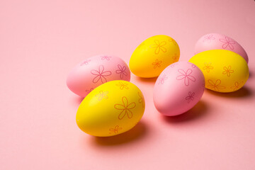  Easter eggs in the nest on light pink background. Promotion and shopping template for Easter