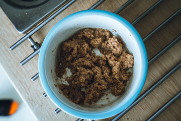 Pet minced meat in bowl, dog food, wet food.