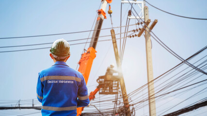Electrical engineer for construction supervision of high voltage distribution system. - obrazy, fototapety, plakaty
