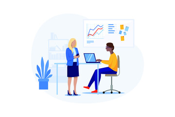 Young woman using mobile phone while talking to man