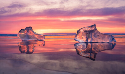 Landscape, sunset on frozen Lake Baikal, ice floe in the foreground, soft focus