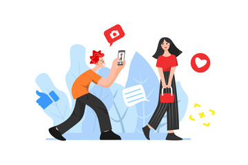 A person is taking pictures of girls in the park to post on social networks