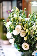 Pure white flowers, floral material for a wedding bouquet., vertical frame, tight crop.