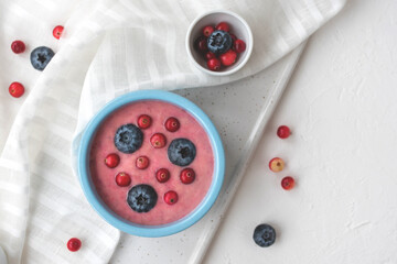Fresh blueberry smoothie on a white background