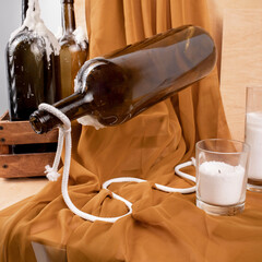 stand for a bottle of wine, in the form of a white rope, beautiful composition