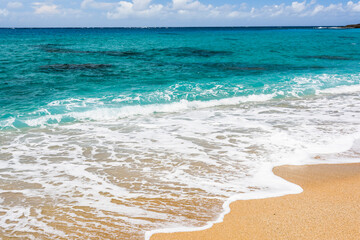 Sea wave with blue sky in the Kenting National Park of Pingtung, Taiwan.