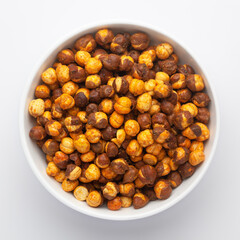 Close-Up of Crunchy Roasted Chana Masala in white Ceramic bowl, made with Bengal Grams or...