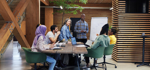 Diverse businesspeople discussing work in a meeting