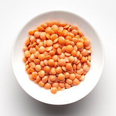 Macro Close-up of Organic masoor dal (Lens culinaris) or whole pink dal inside a ceramic white bowl. Top view 
